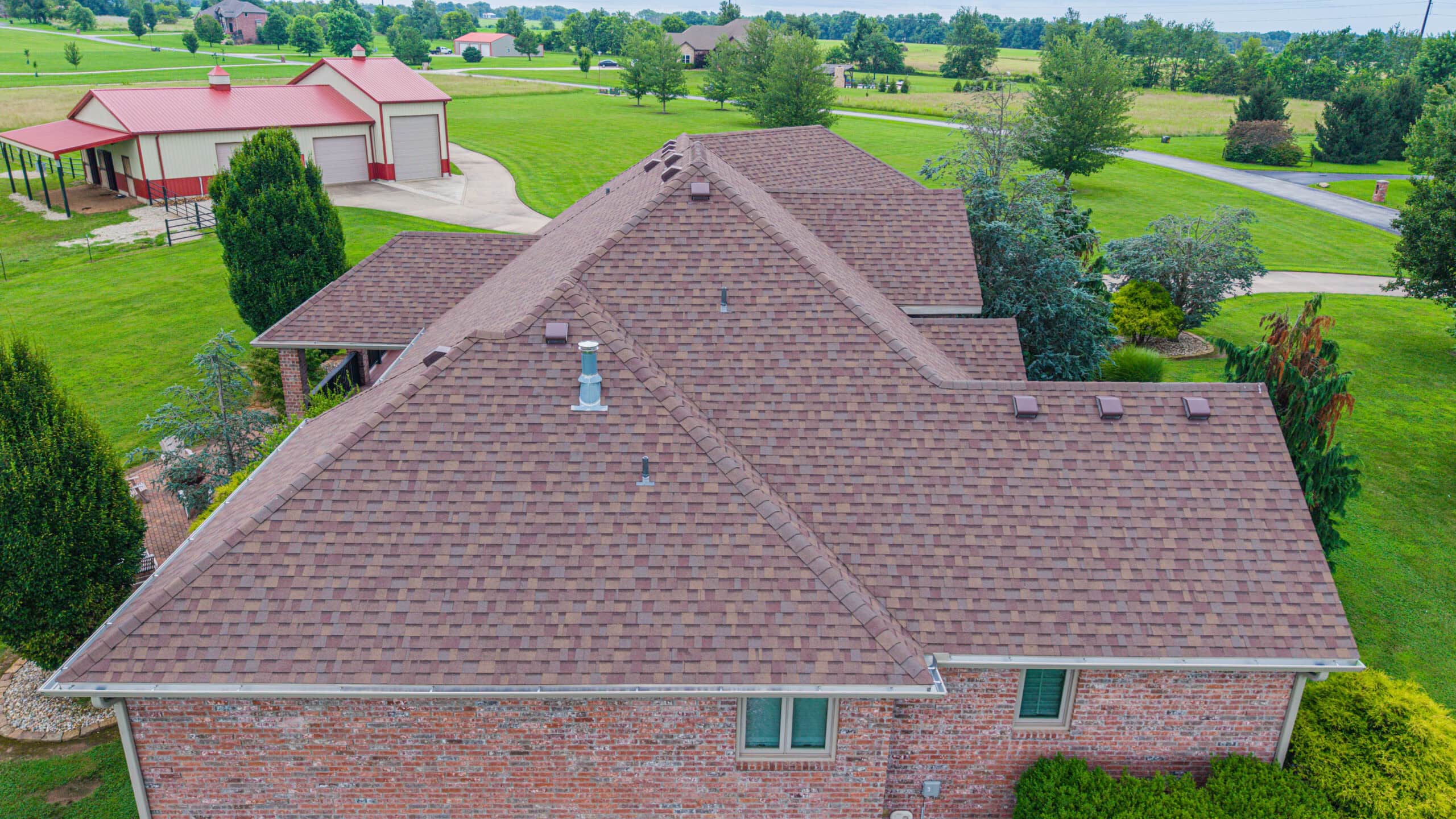 Residential roofing installation with durable shingles in Midwest Roofing project.