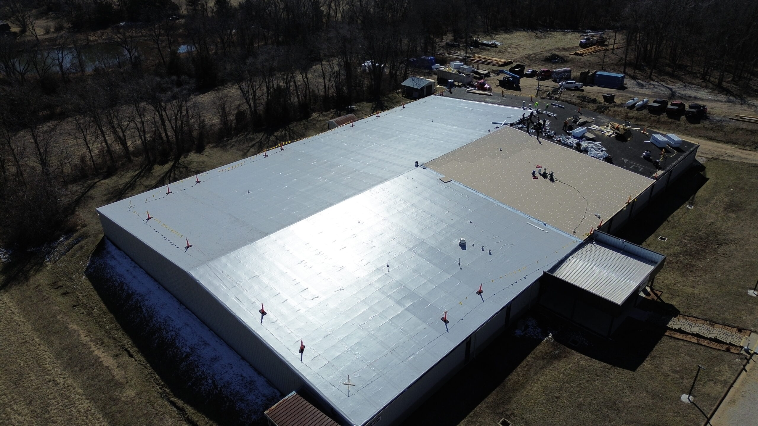Aerial view of Midwest Roofing warehouse with metal roofing panels.