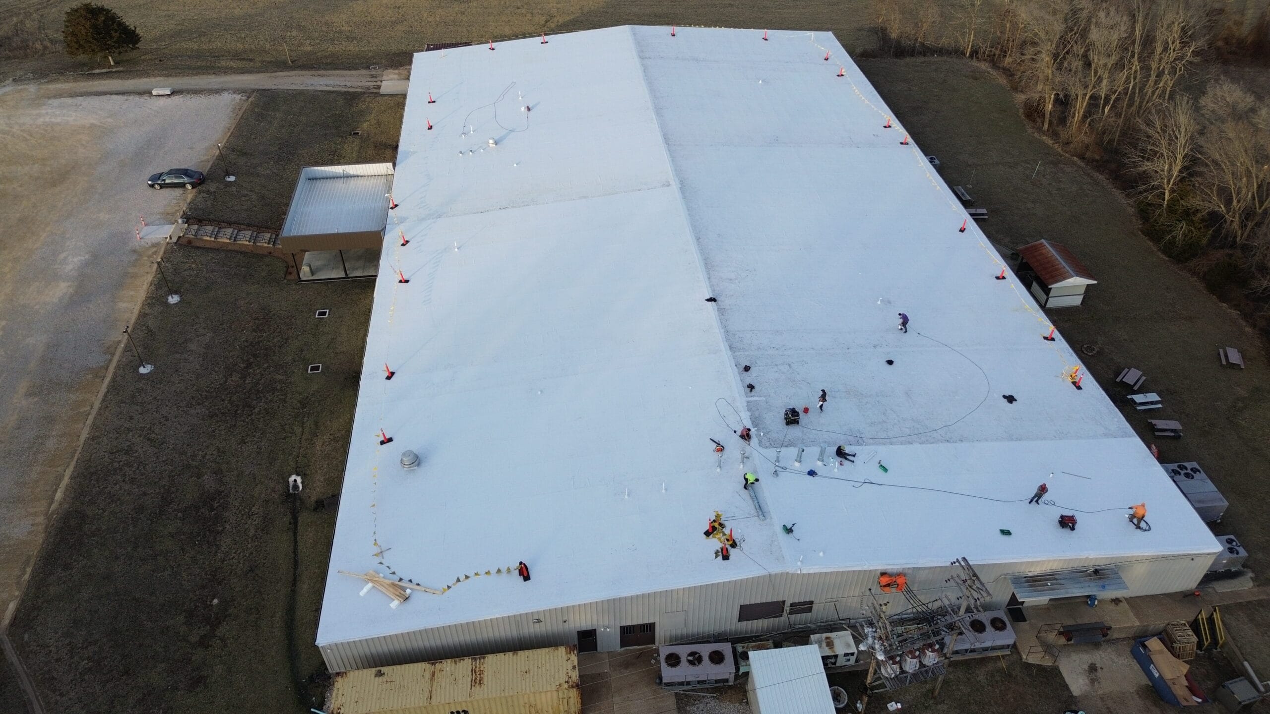 Aerial view of a large commercial roofing project by Midwest Roofing, showcasing professional instal.
