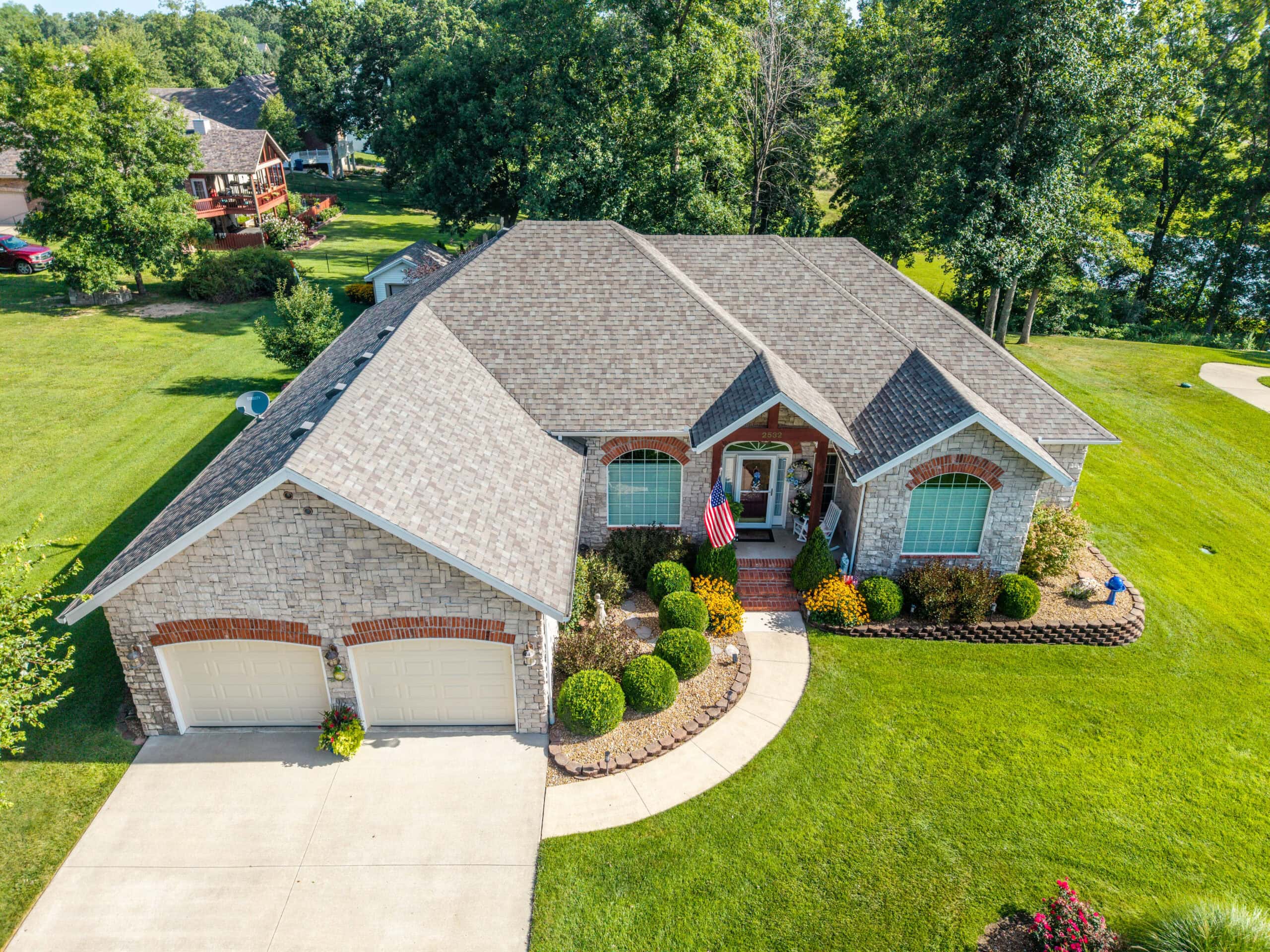 Modern residential roof with new shingles in Lebanon, Missouri.