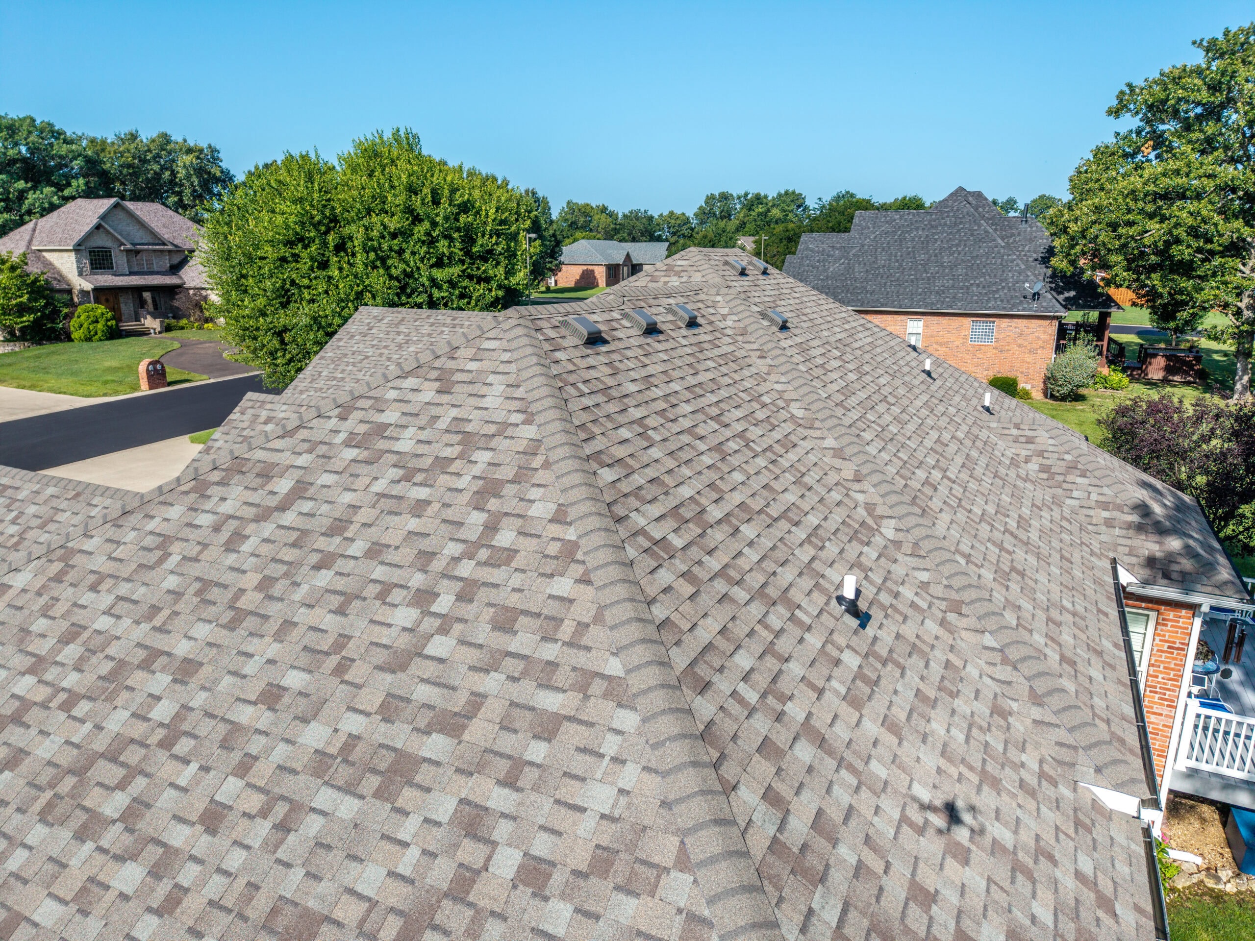 New asphalt shingle roof installed on a residential home in Lebanon, Missouri.
