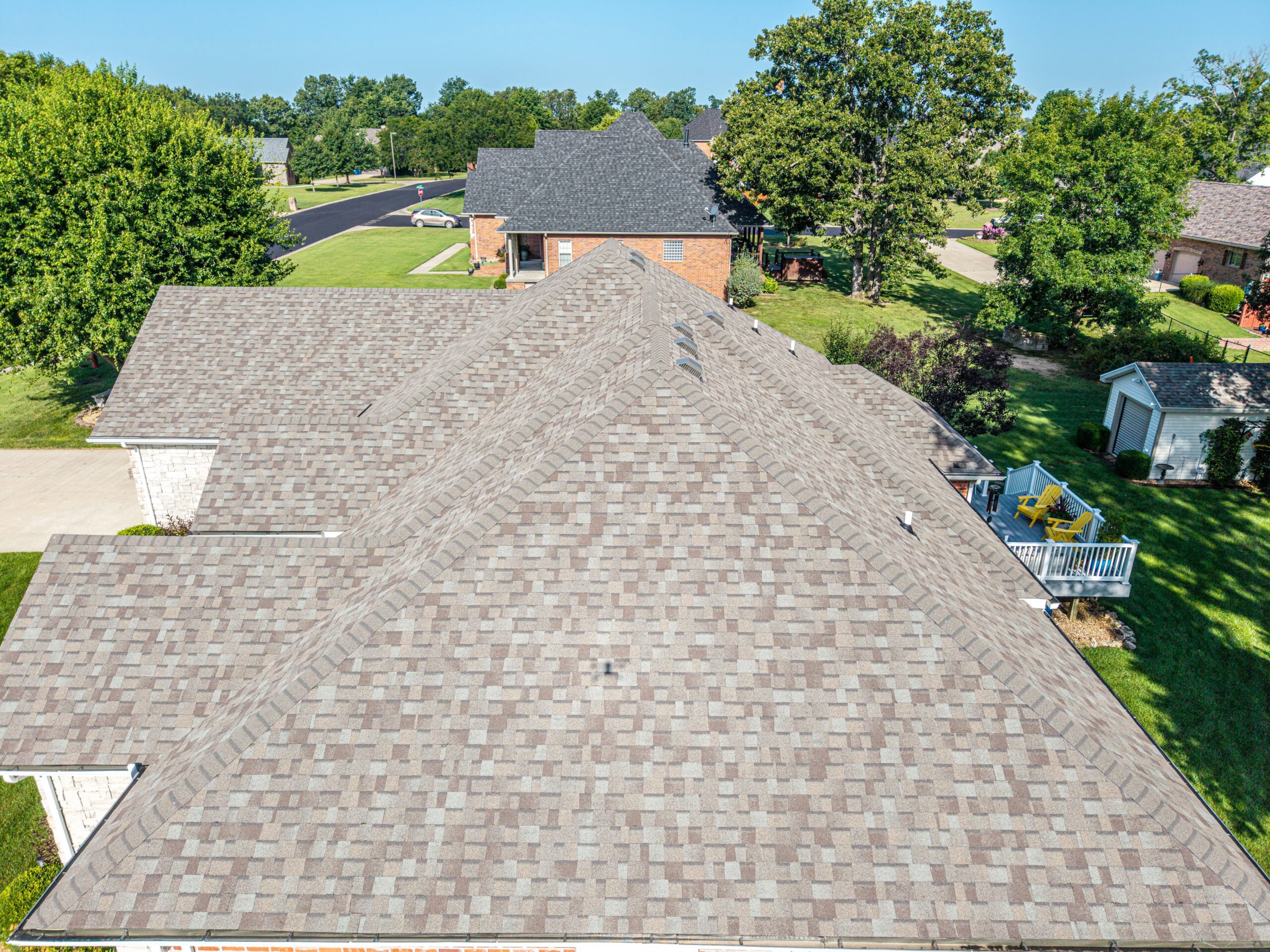 New asphalt shingle roof installed on a residential home in Lebanon, Missouri.