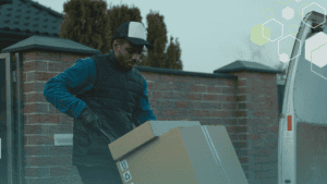 Industrial worker analyzing data on Revify Analytics platform outdoors.