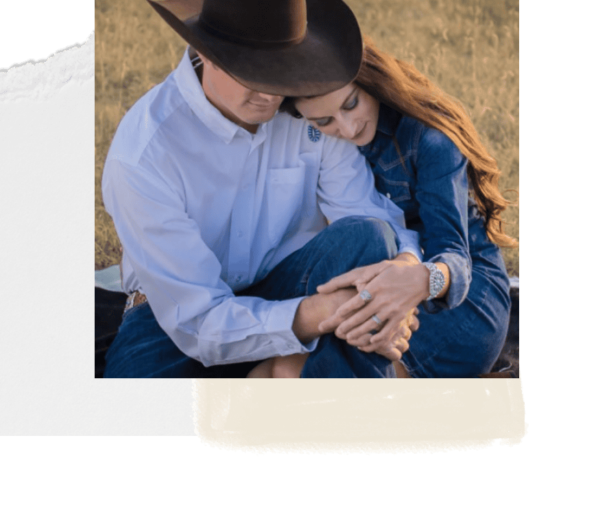 Sweet couple sitting closely outdoors, celebrating love, best engagement photography at My Roots Photography Co.