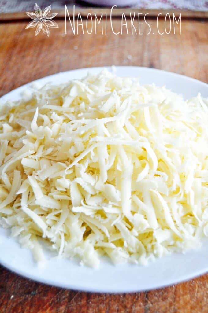 plate of shredded mozzarella cheese