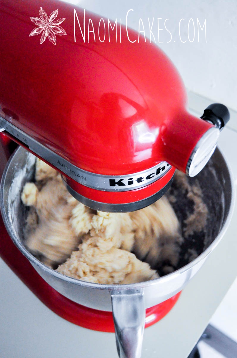overhead view of sugar cookie dough mixing in a stand mixer
