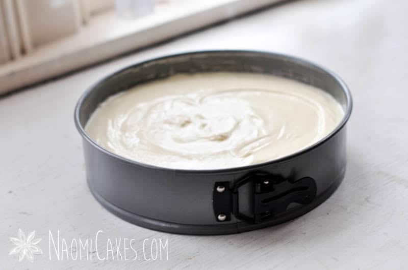 unbaked cheesecake in a springform pan