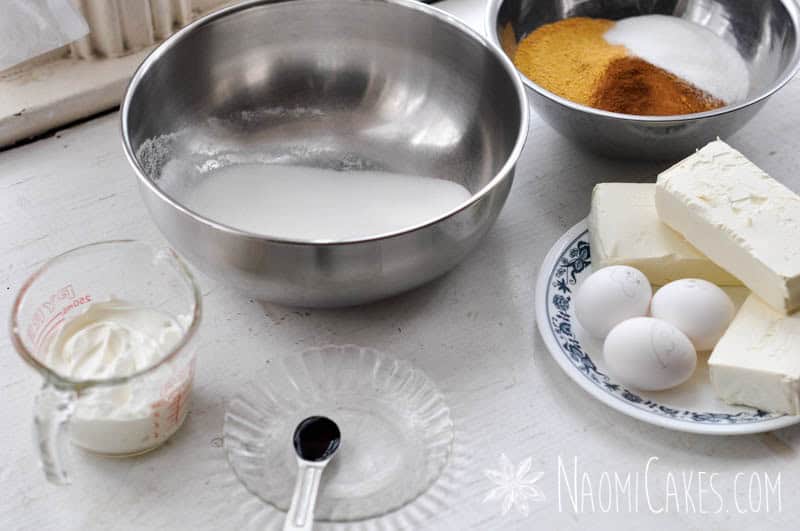 cheesecake ingredients on a white counter