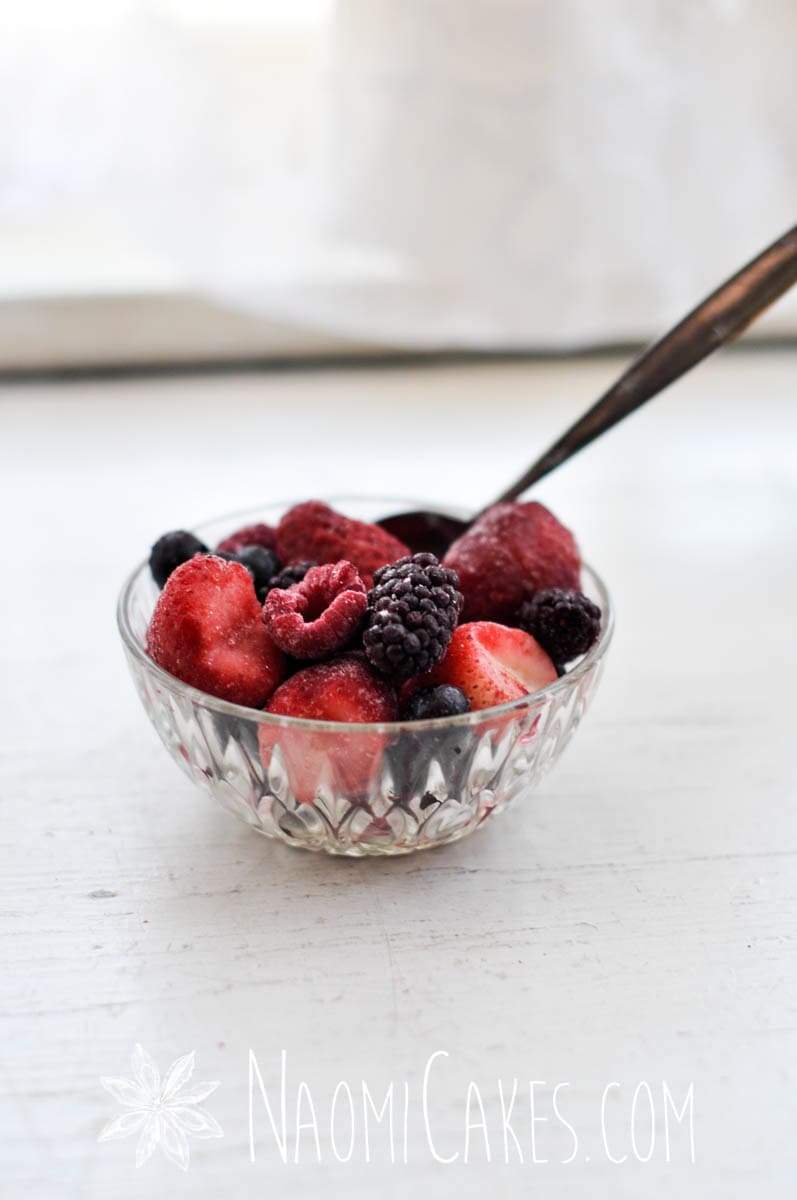 bowl of frozen fruit with a spoon
