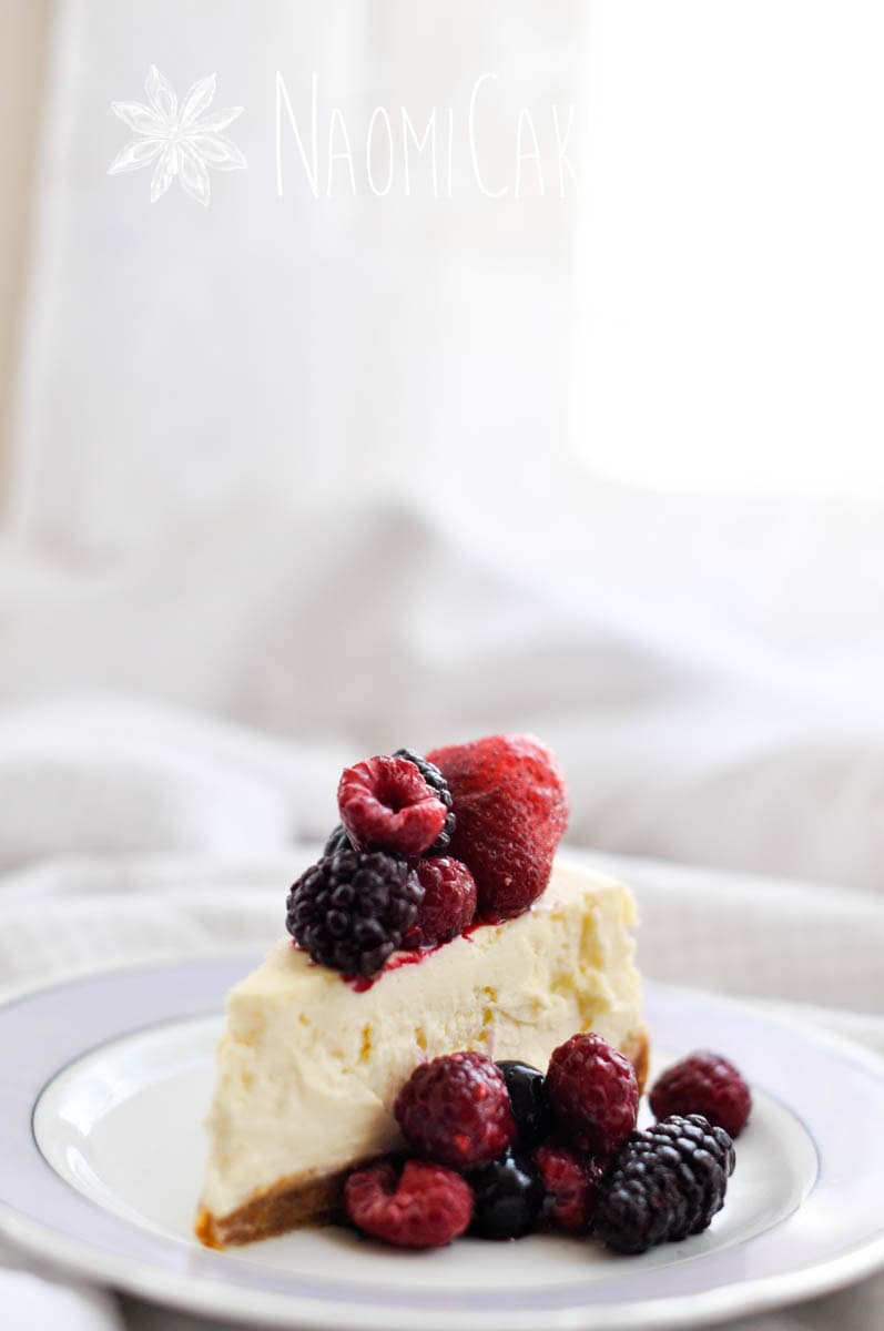 slice of cheesecake with frozen fruit on top