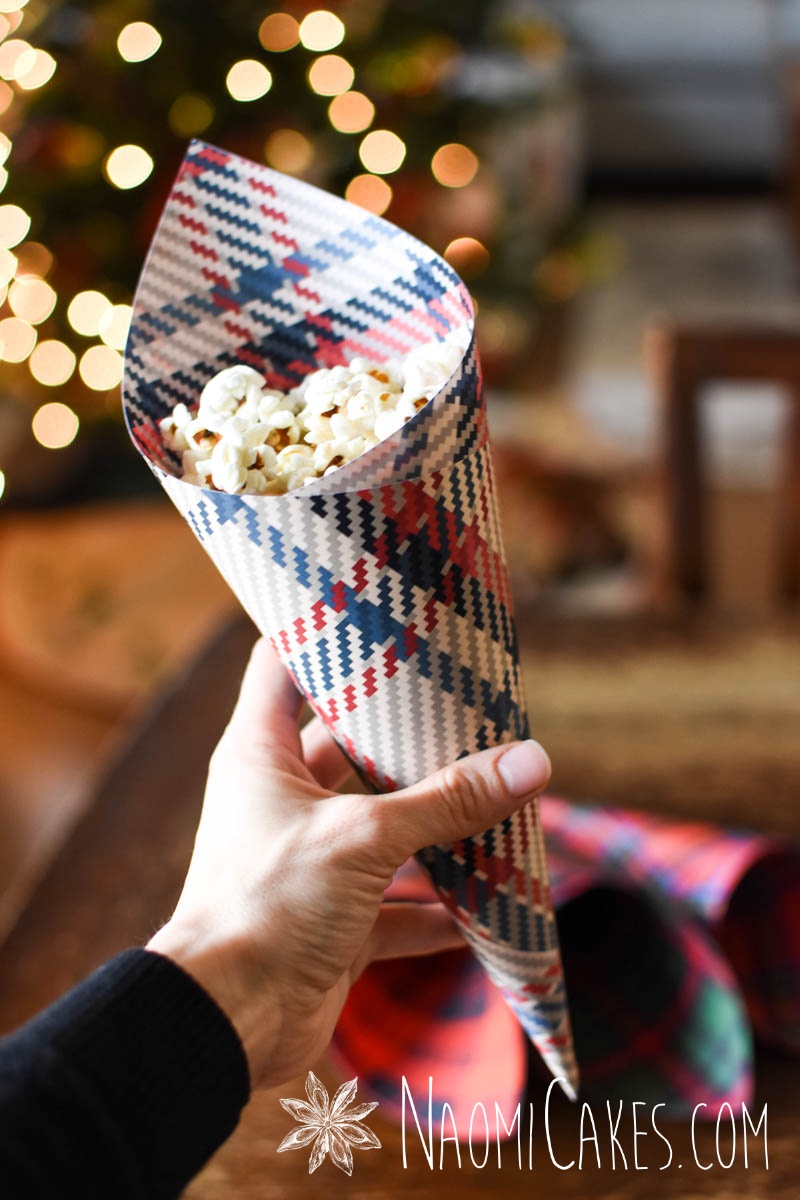 Blue and red on white plaid Christmas paper cone with popcorn