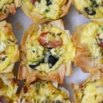 miniature quiche with spinach, tomato and feta cheese with filo pastry