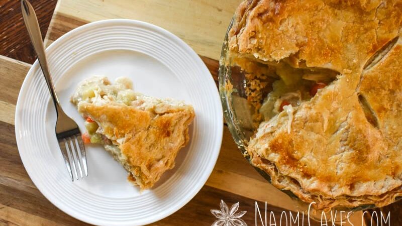 overhead view of a slice of chicken pie and the pie it came from