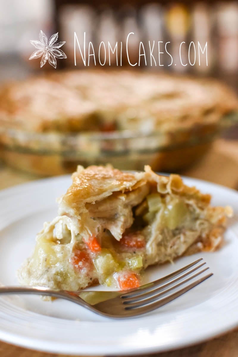 side view of a slice of chicken pot pie with vegetables