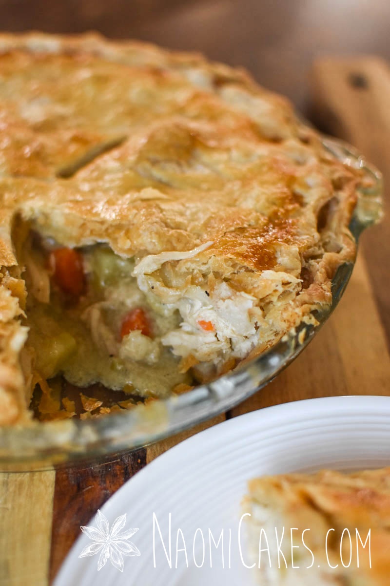 a chicken pot pie with a slice taken out of the plate