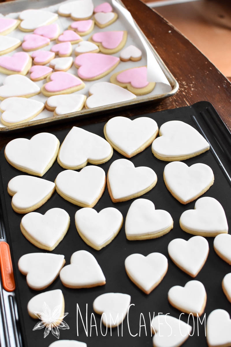 heart shaped sugar cookies with pink and white fondant 