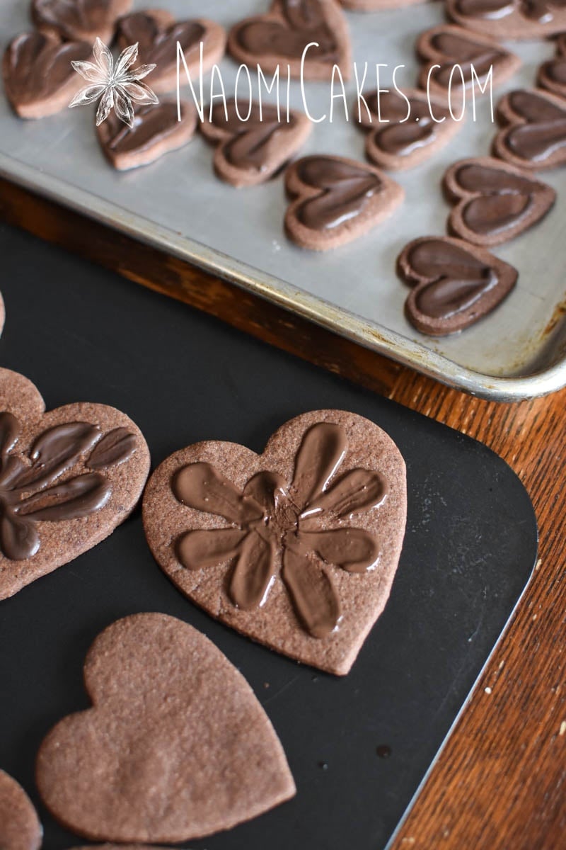 chocolate heart shaped sugar cookies with chocolate decoration