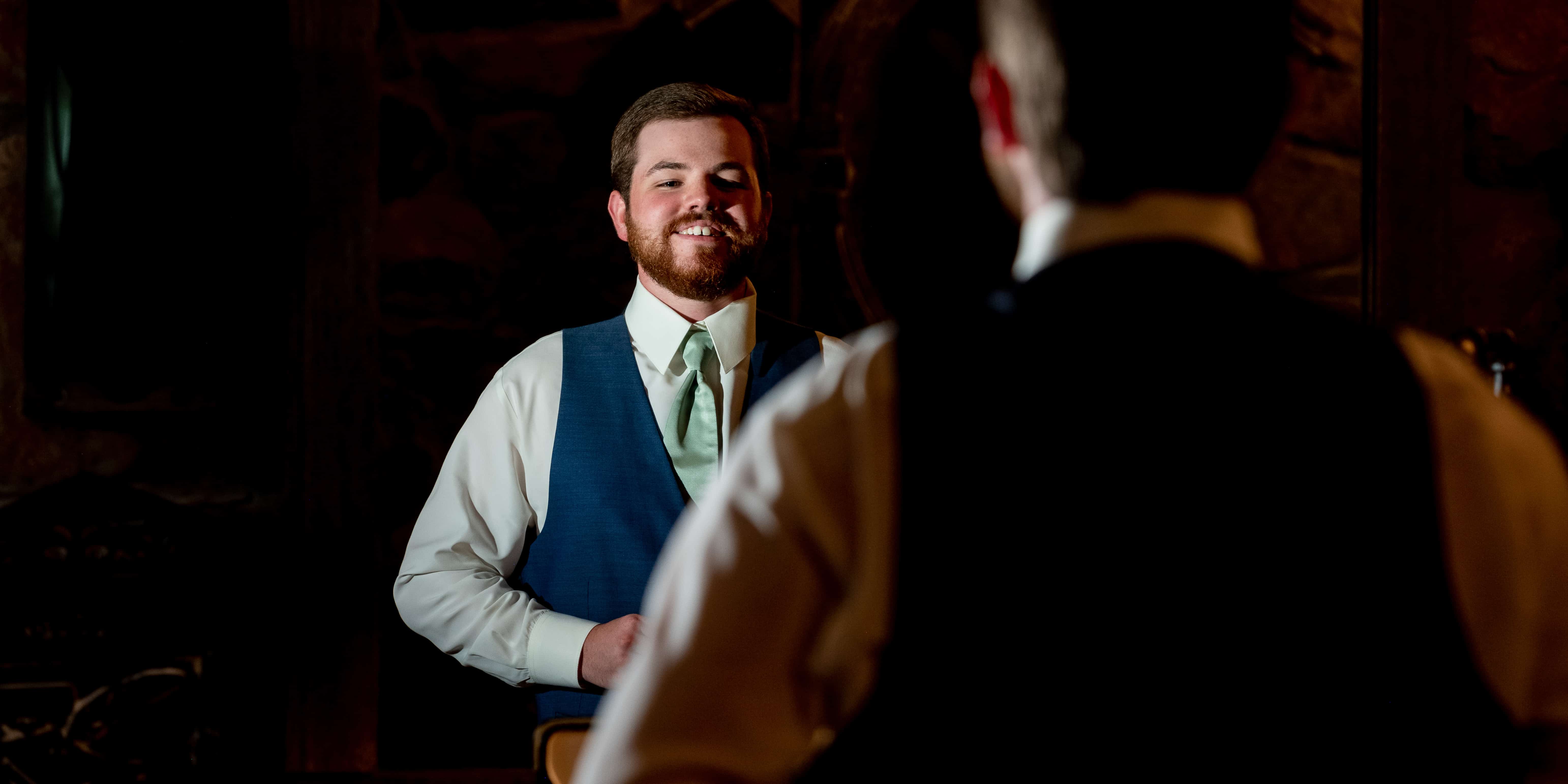groom in mirror