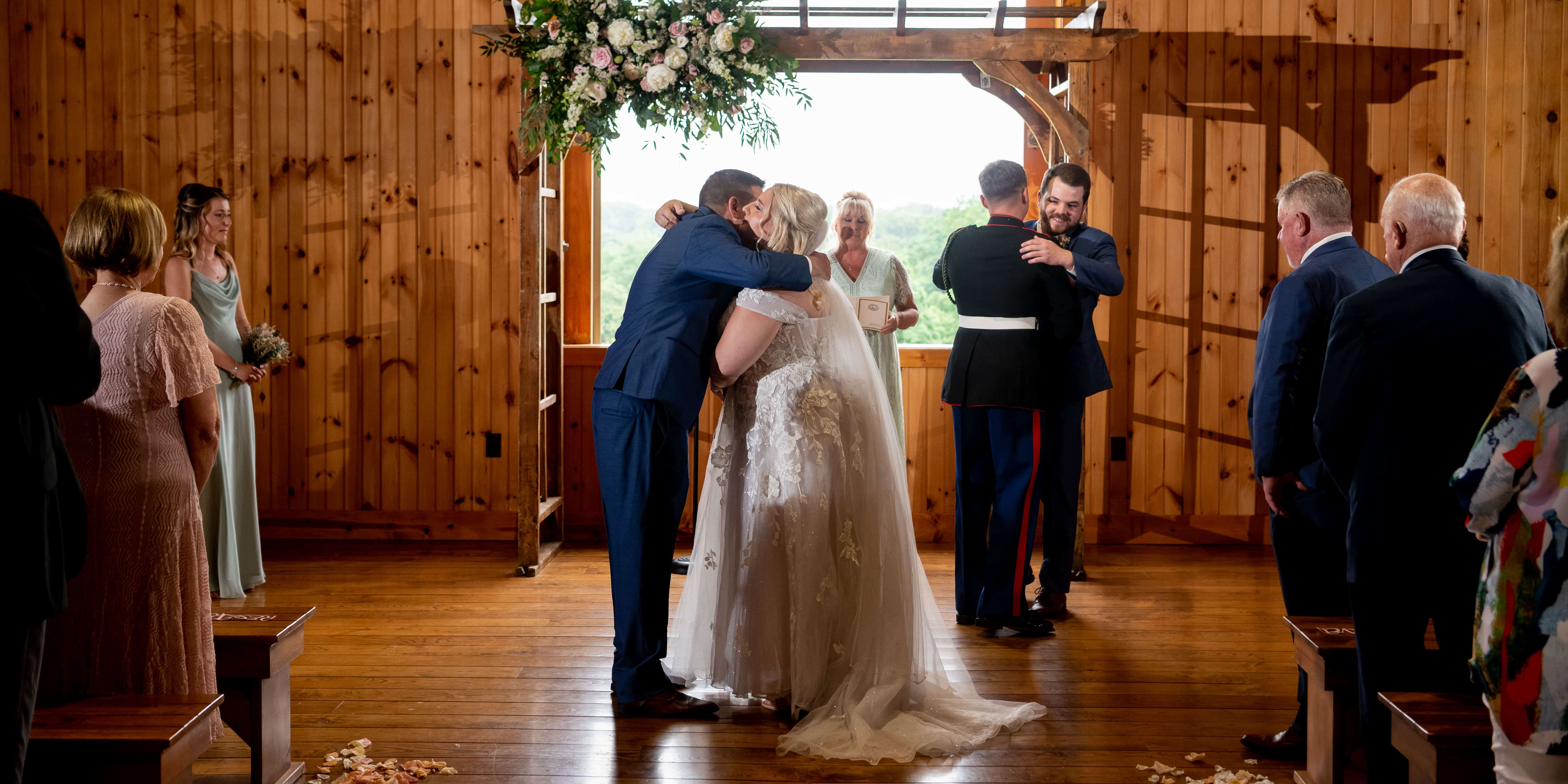 Bride hugging dad at wedding