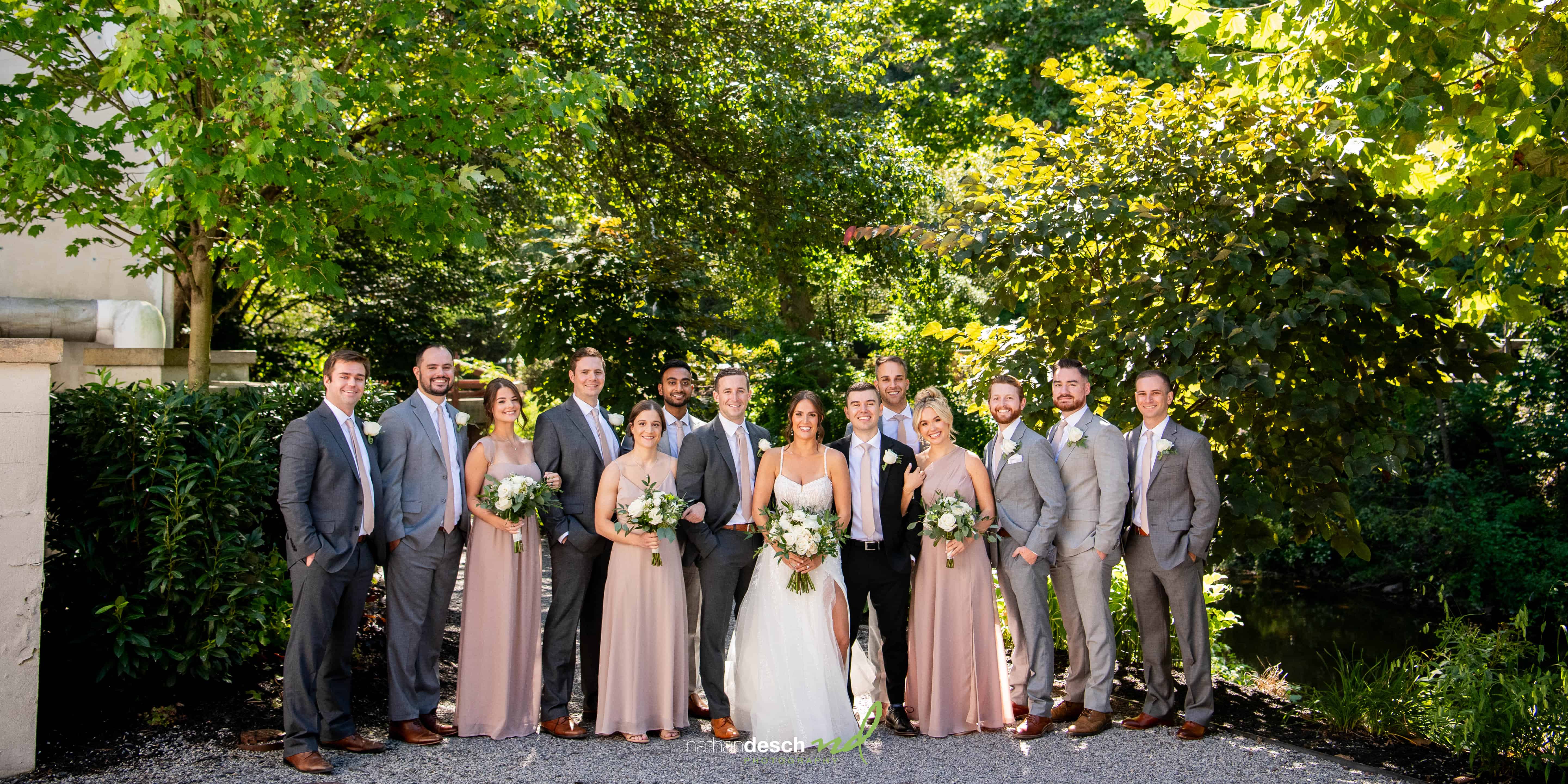 full wedding party at river house at odettes