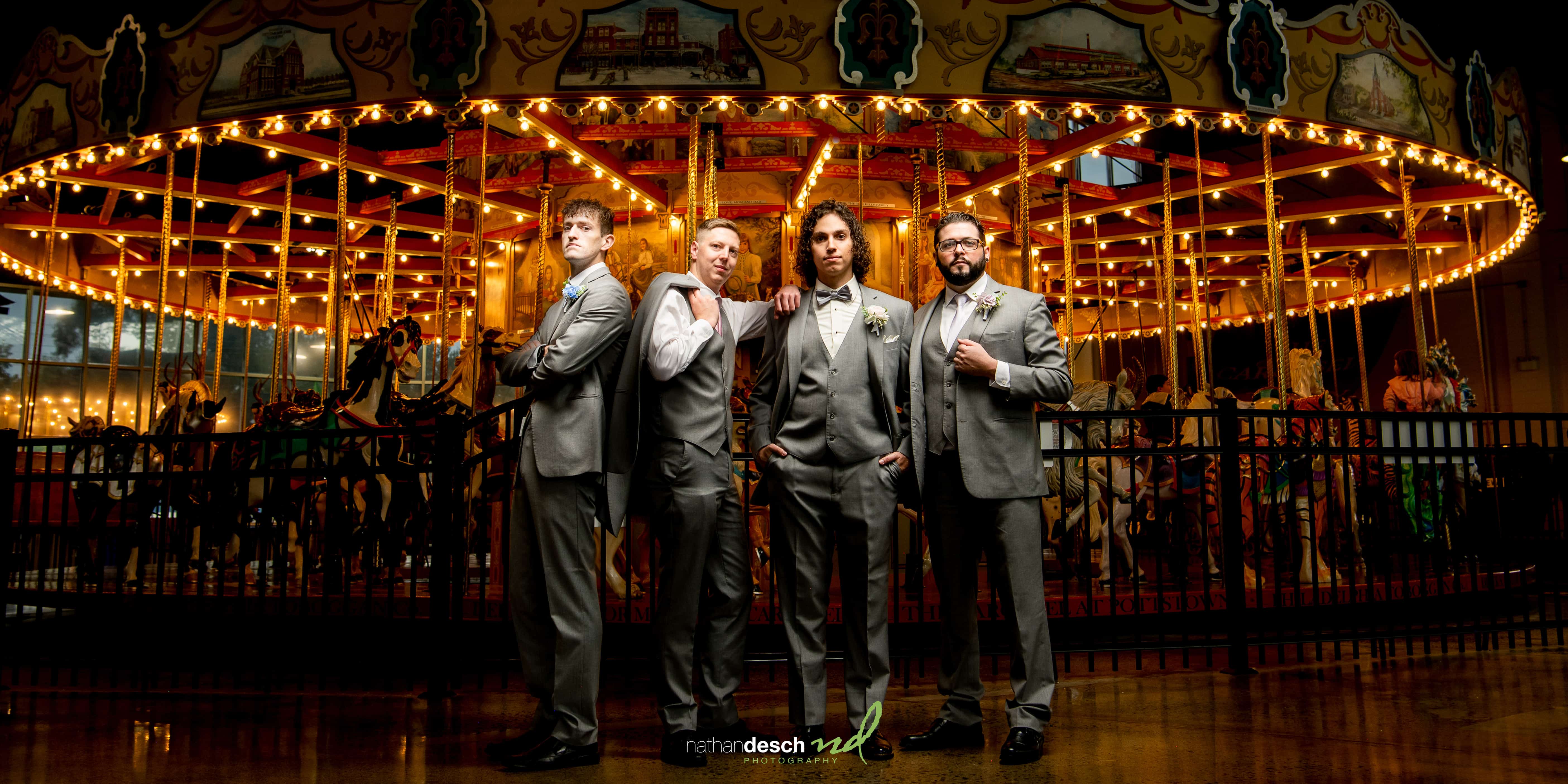 Groom and groomsmen at carousel