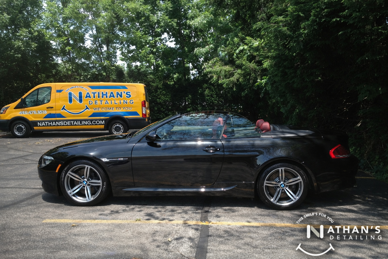 Black bmw convertible detailed with van during mobile detailing