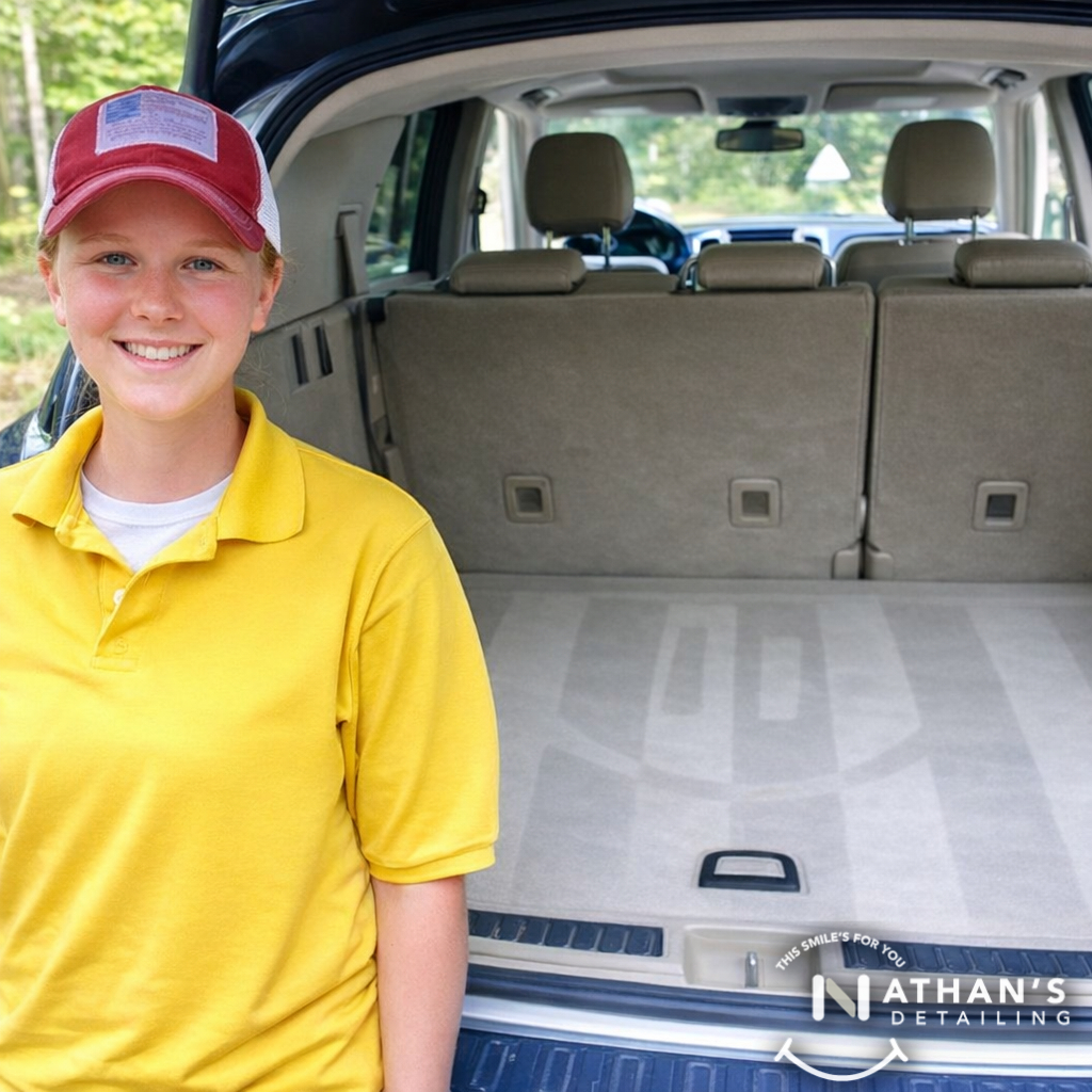 Clean suv cargo area with detailing tech during mobile detailing in Solon