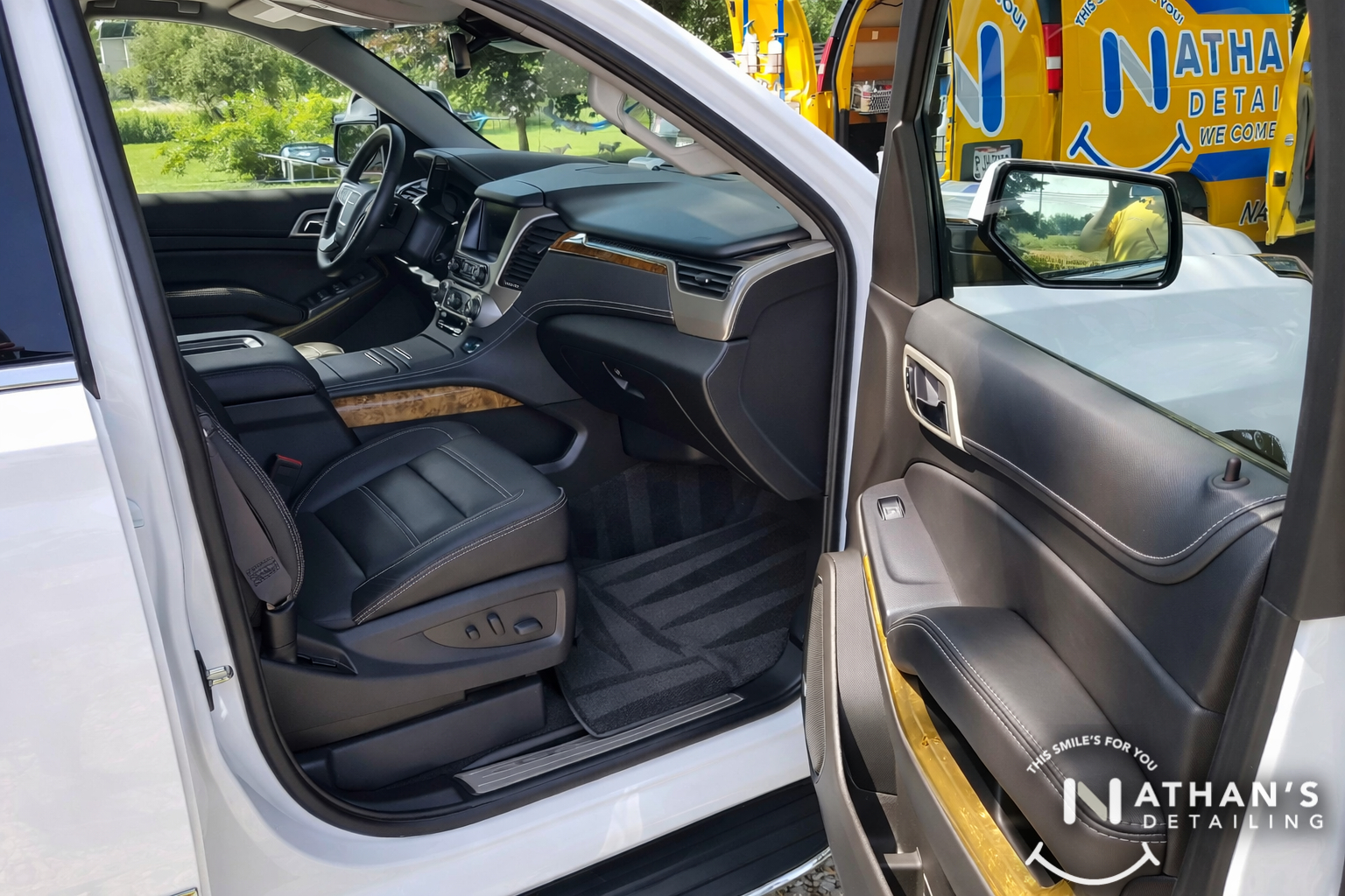 Cleaned front seat and floor mat interior detail during mobile detailing