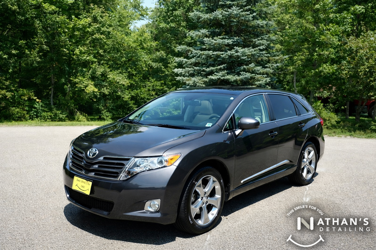 Freshly detailed gray crossover in parking lot during mobile detailing in Cleveland