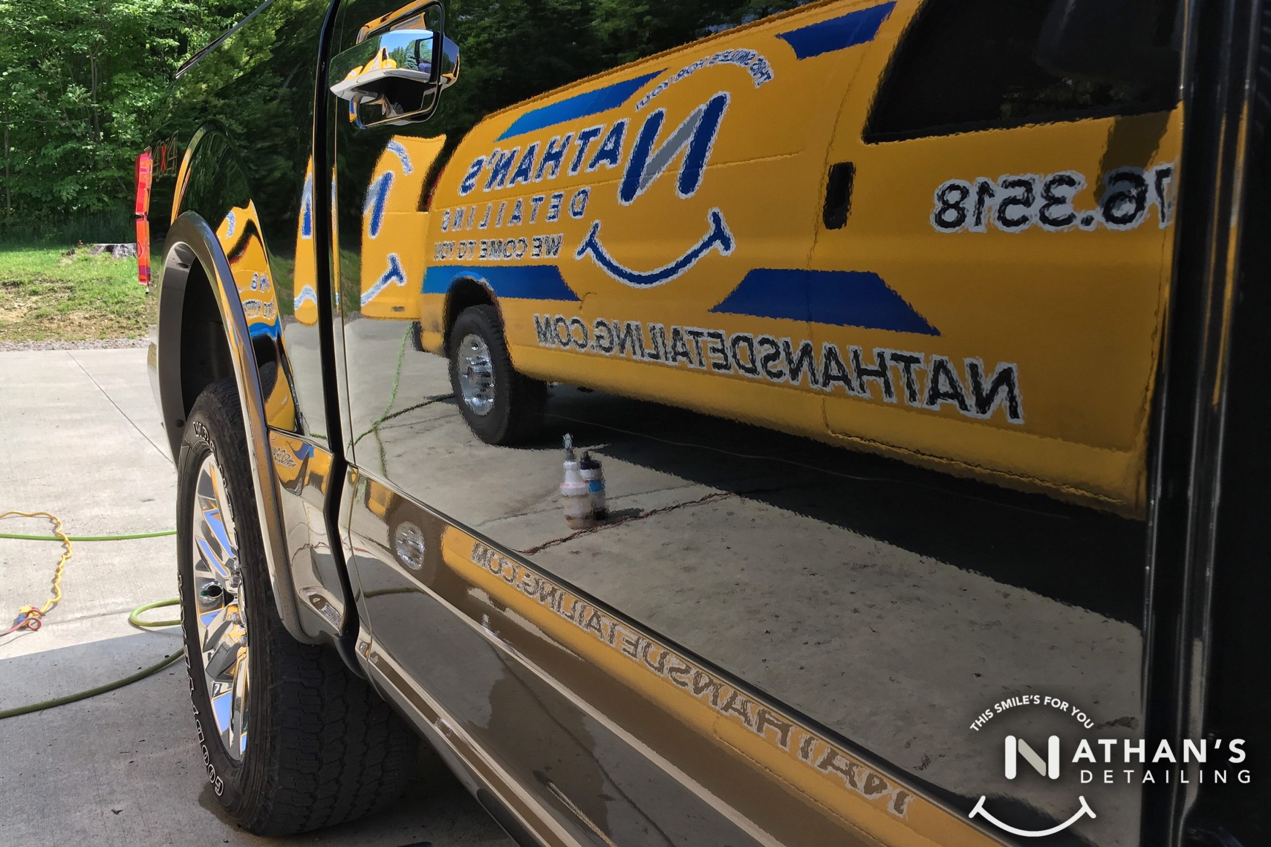 Glossy paint reflection of service van during mobile detailing