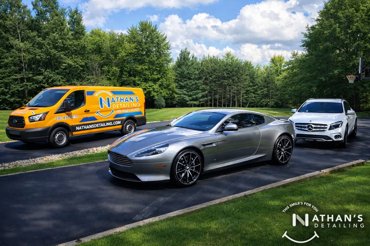 Nathan’s Detailing mobile service van performing on-site detailing for two cars in a driveway.