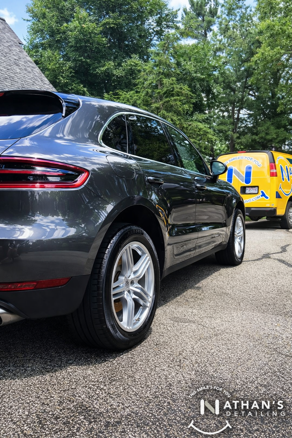 Mobile detailing gray suv with service van