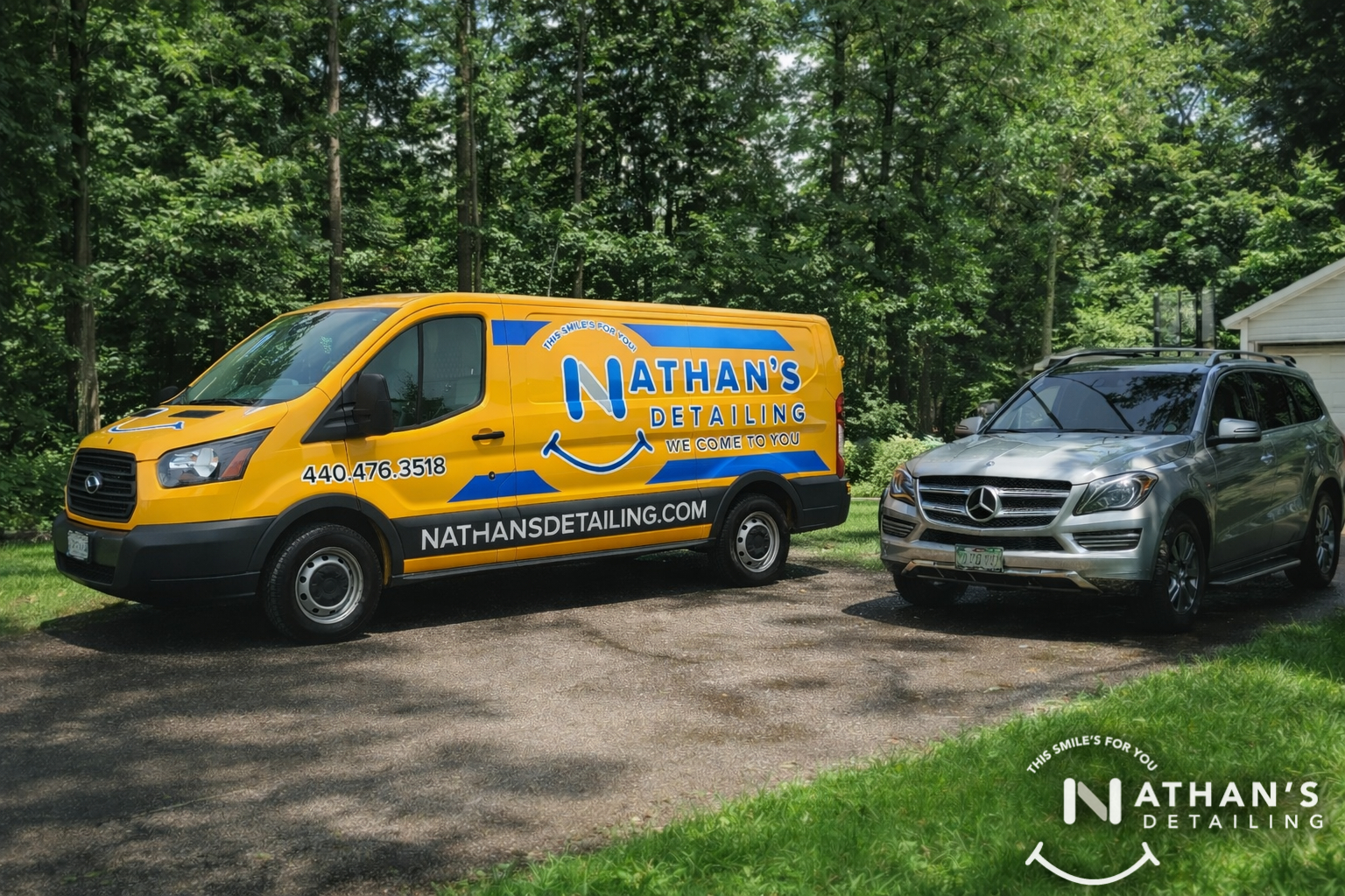 Mobile detailing van next to silver suv