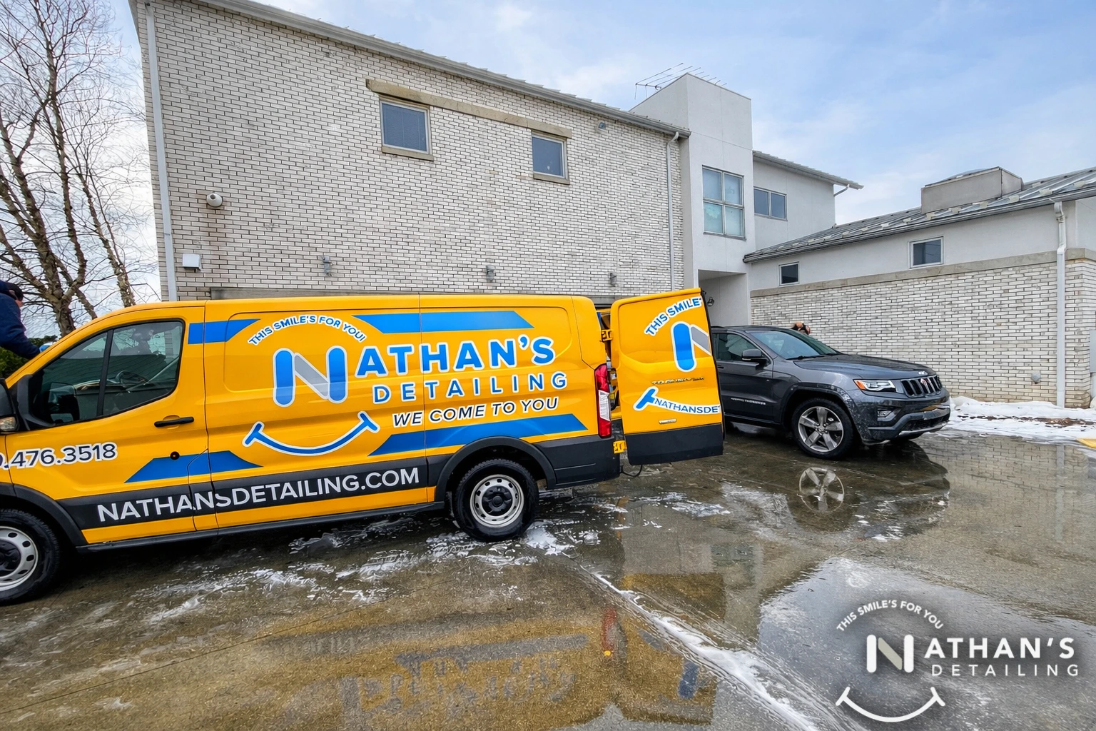 Professional mobile car detailing service van set up for on-site vehicle cleaning.