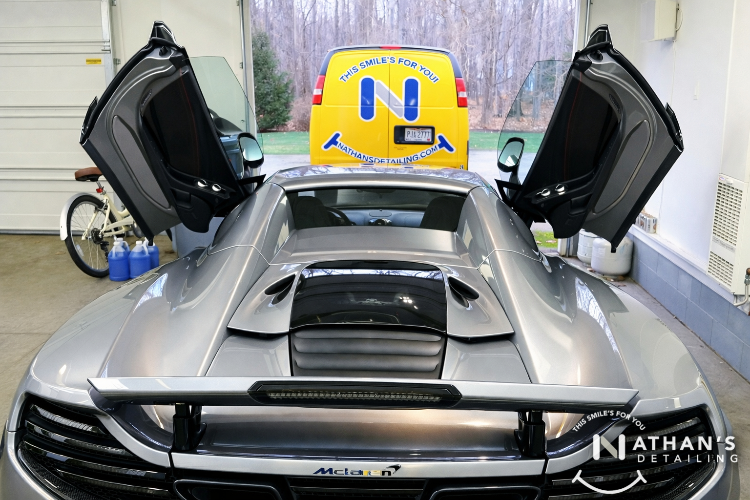 Supercar in garage with doors open during mobile detailing in Parma
