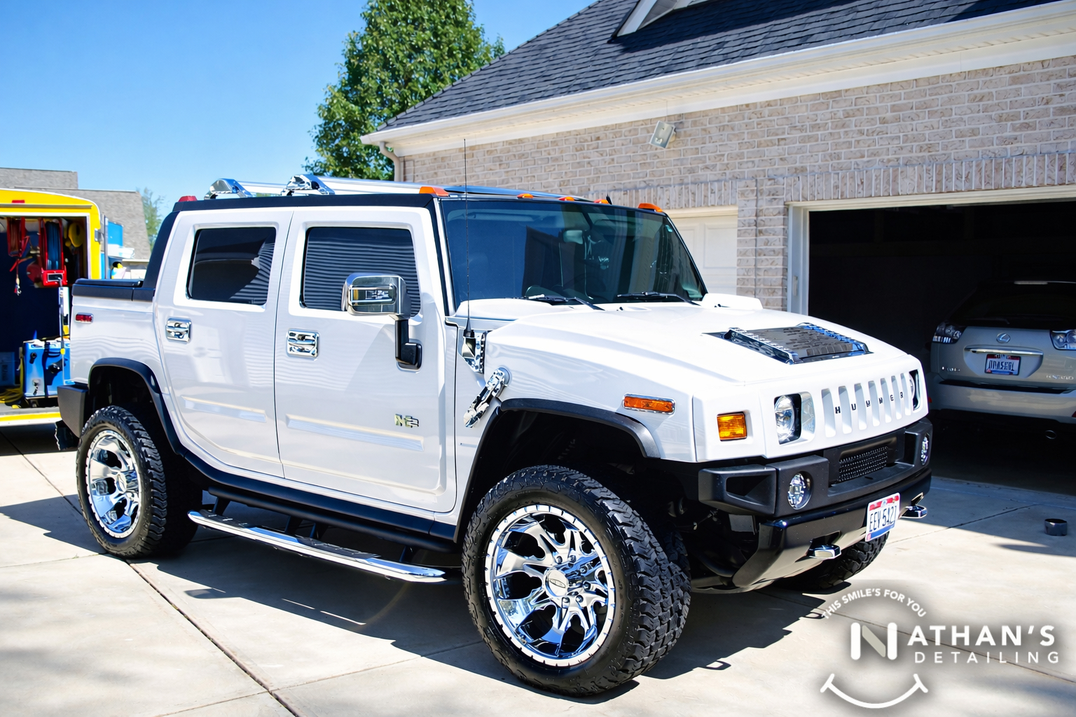 White hummer ready after mobile detail during mobile detailing