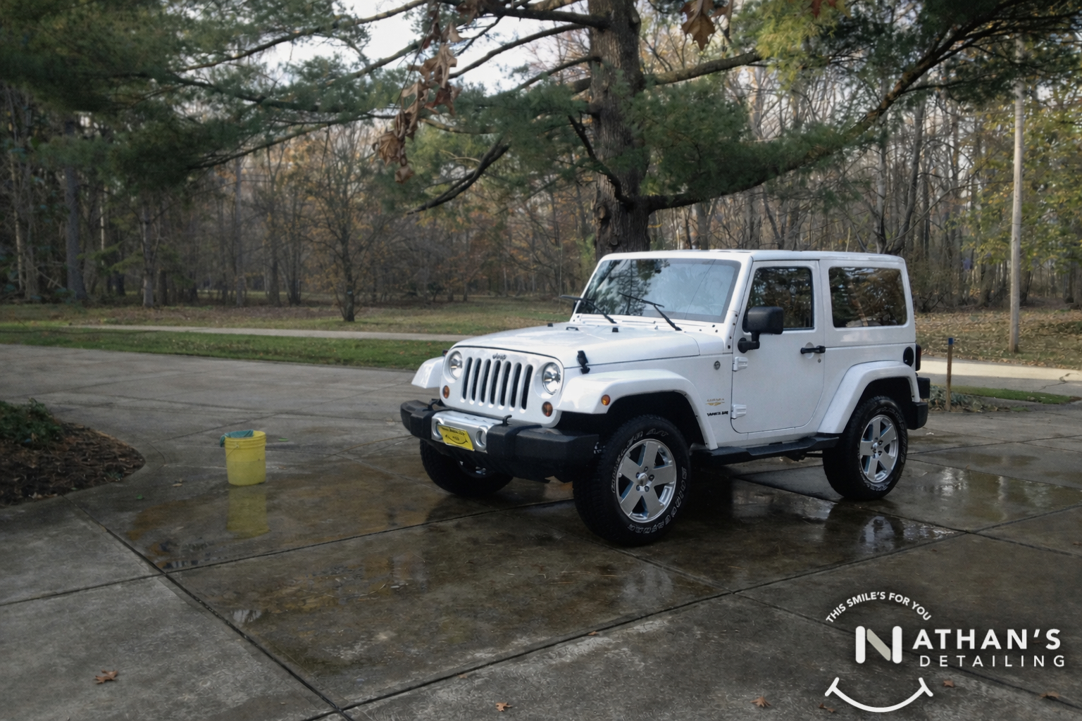 White wrangler on driveway after wash during mobile detailing