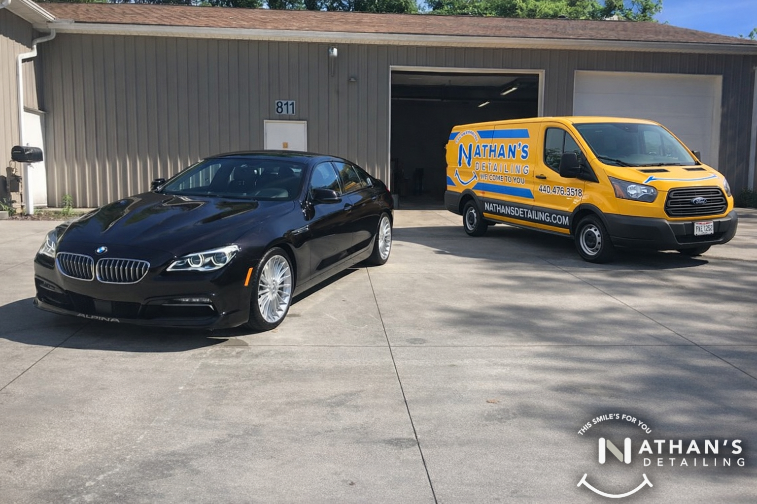 Black bmw coupe outside detail bay during mobile detailing