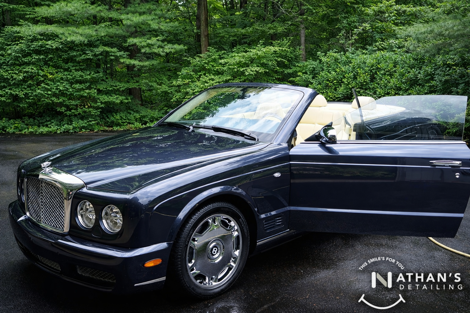 Black convertible side profile detailed during mobile detailing in Beachwood