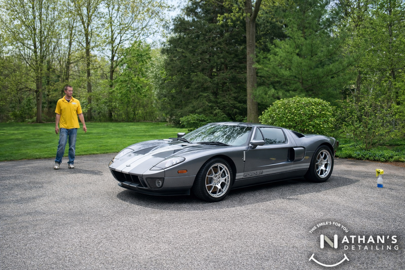 Detailed gray supercar parked in driveway during mobile detailing in Warrensville Hts