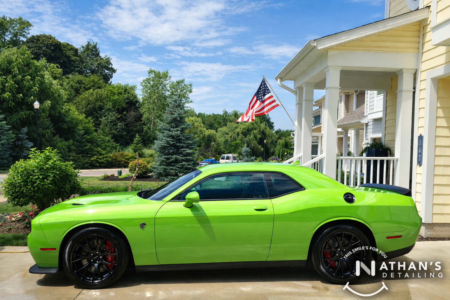 Green challenger side view after detail during mobile detailing