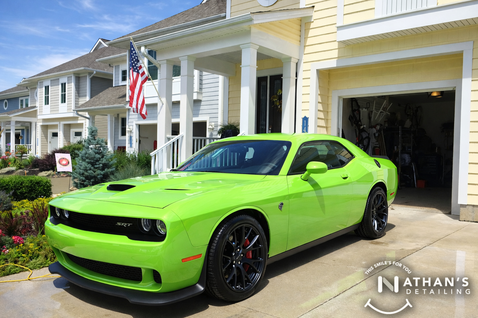 Lime green coupe cleaned in front drive during mobile detailing