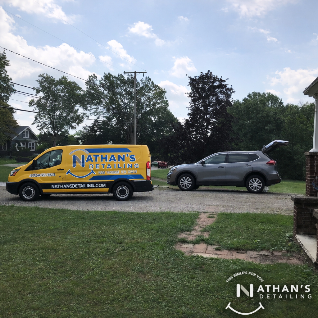 Mobile detail van parked beside gray suv during mobile detailing