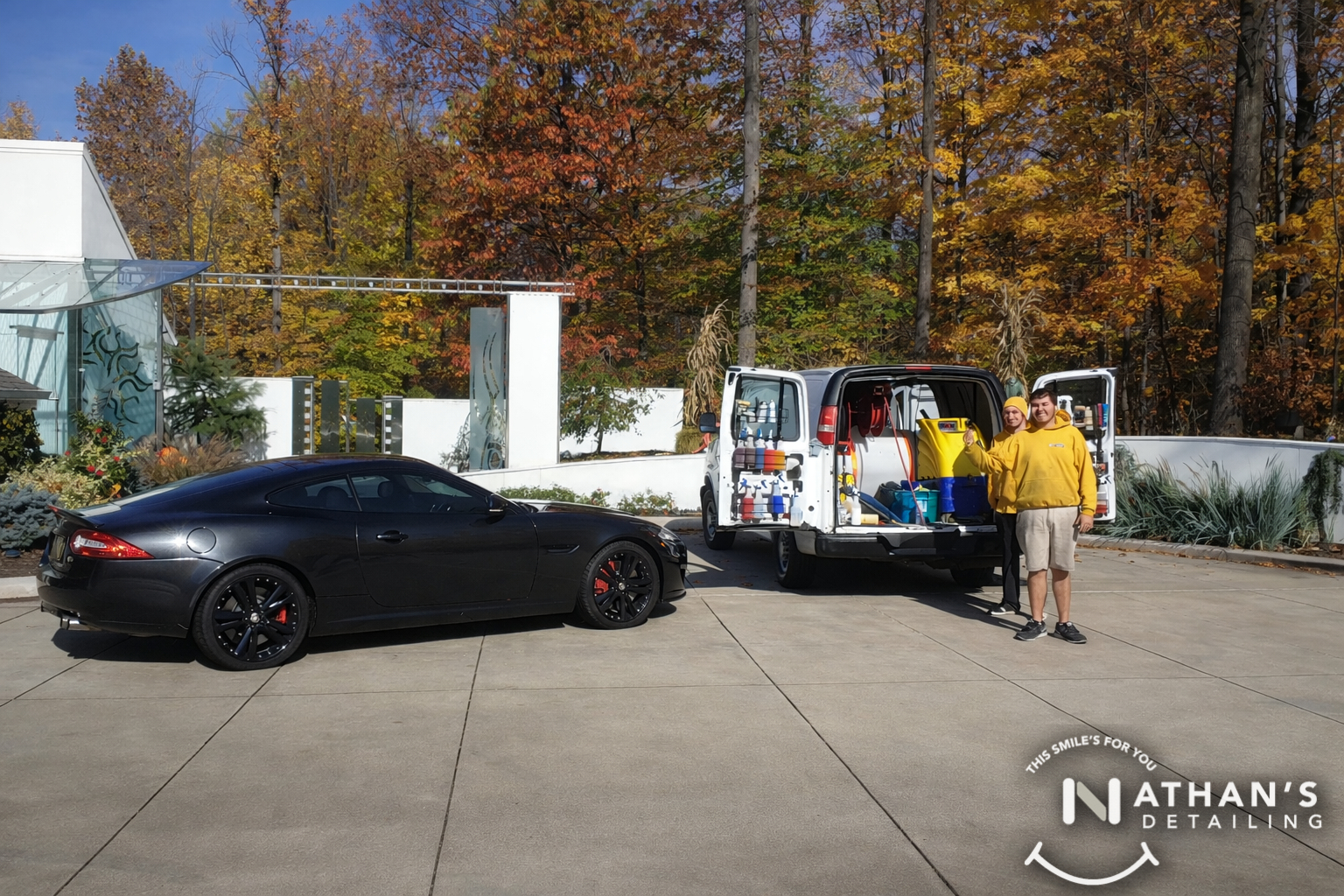 Mobile detailing setup with van doors open in Stow