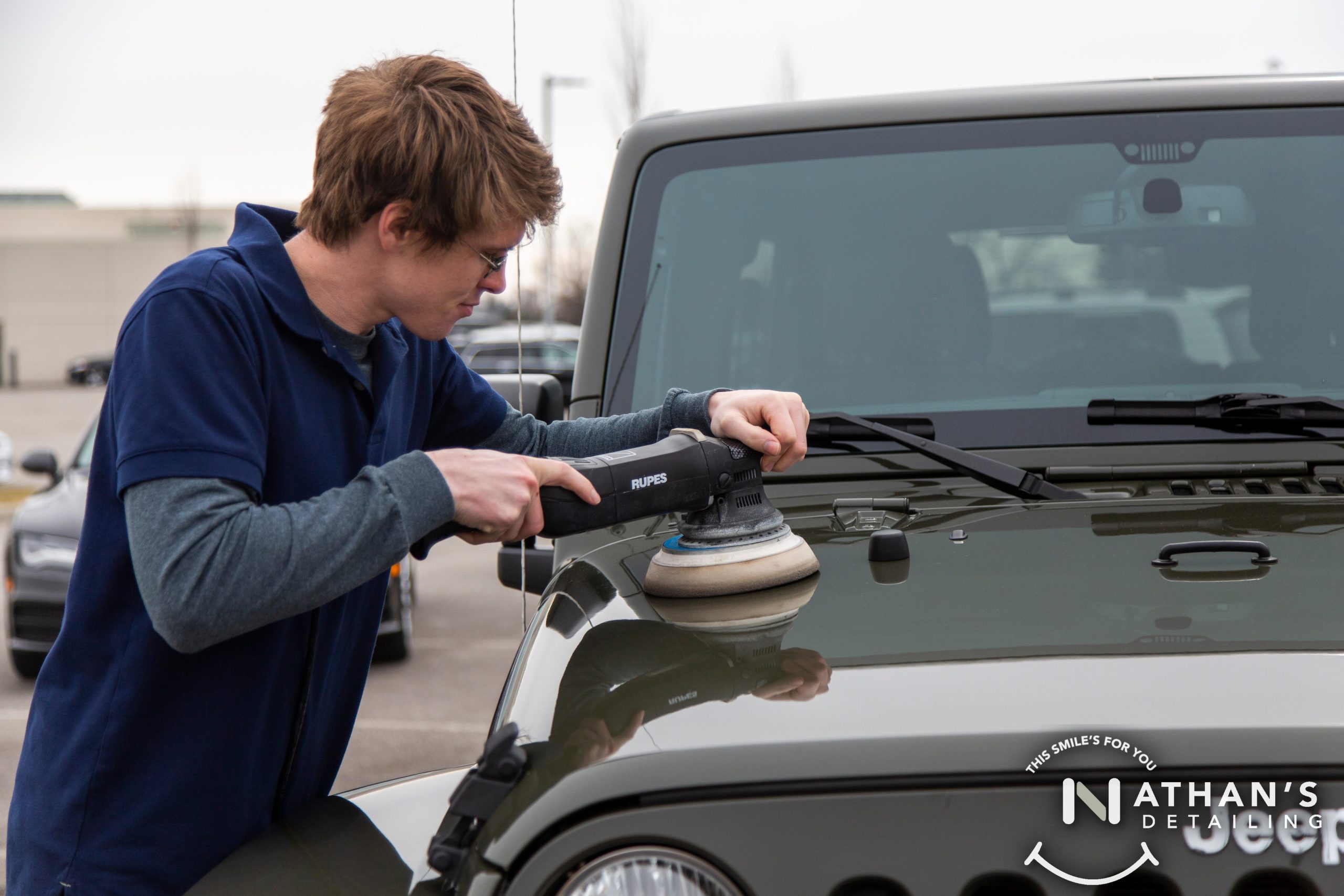 Paint polishing hood dual action polisher during mobile detailing
