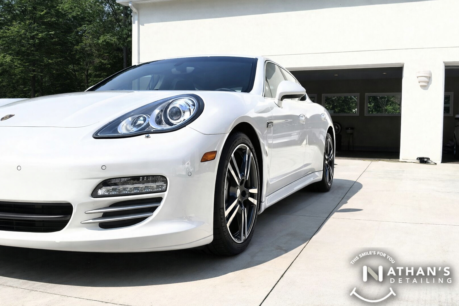 White porsche front end gloss in driveway during mobile detailing