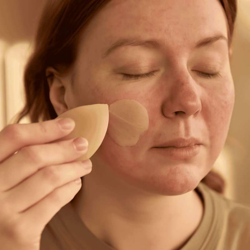 Step-by-step rosacea makeup routine showing green corrector and mineral foundation application