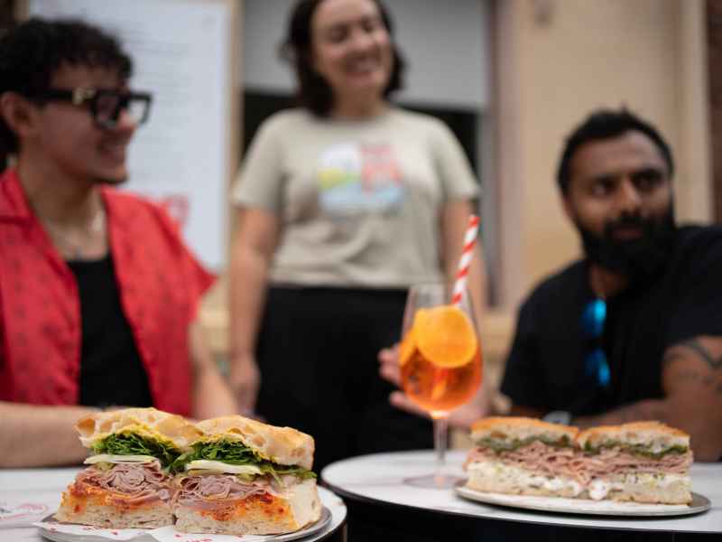 Food and street art experience in Newcastle, featuring delicious local cuisine and vibrant murals. Perfect for exploring the city's culinary scene and urban art culture.