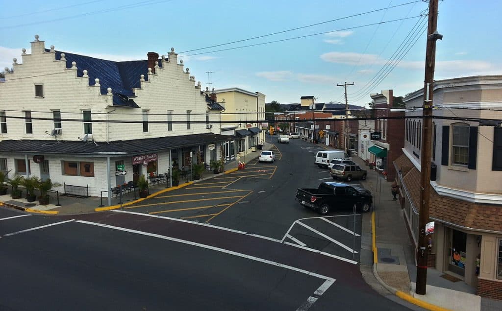 "Small town charm: A quaint Main Street lined with historic buildings and local businesses"