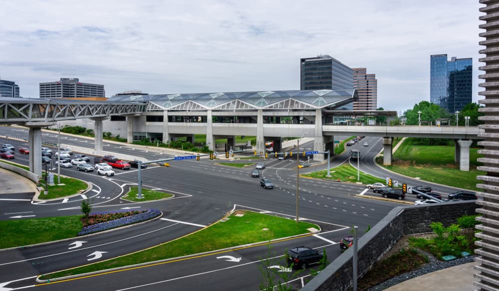 Urban Transit Hub: Modern Elevated Station Bridges City Streets